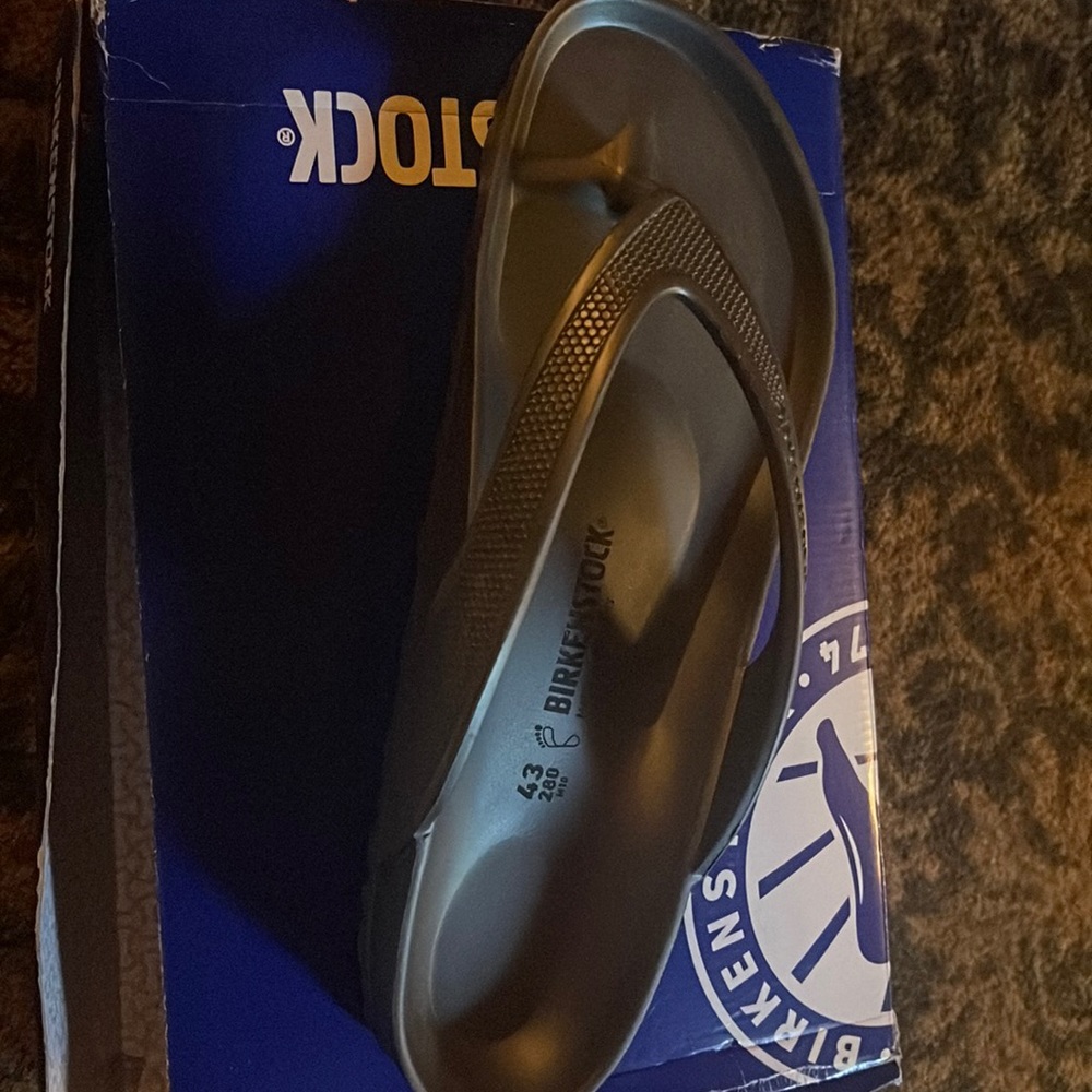 Black men Birkenstock flip flop sandals